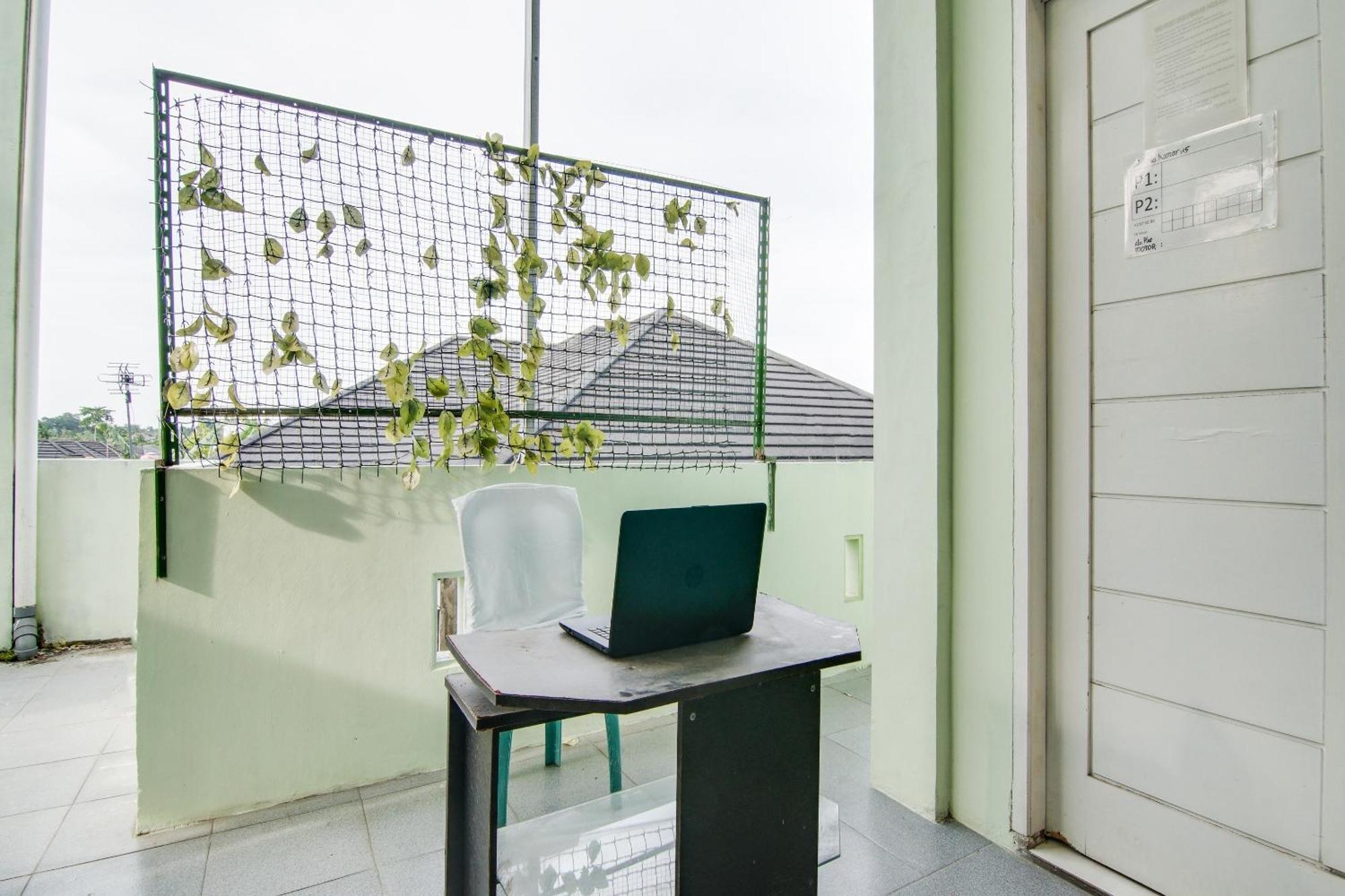 Spot On 91858 Raja Homestay Syariah Pekanbaru Exterior foto
