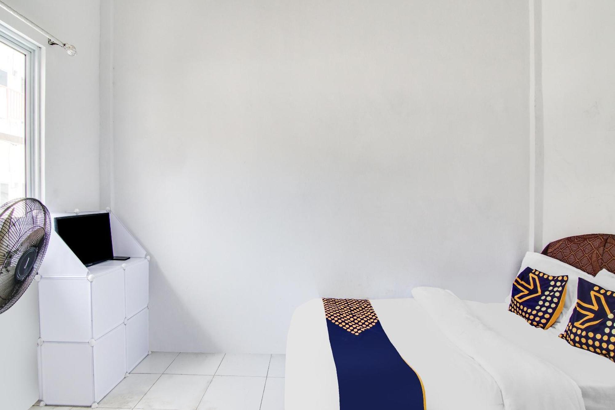 Spot On 91858 Raja Homestay Syariah Pekanbaru Exterior foto